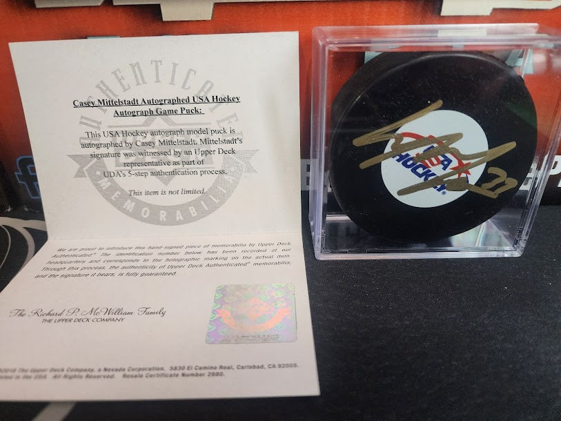 Casey Mittelstadt Autographed USA Game Puck Upper Deck COA Bruins