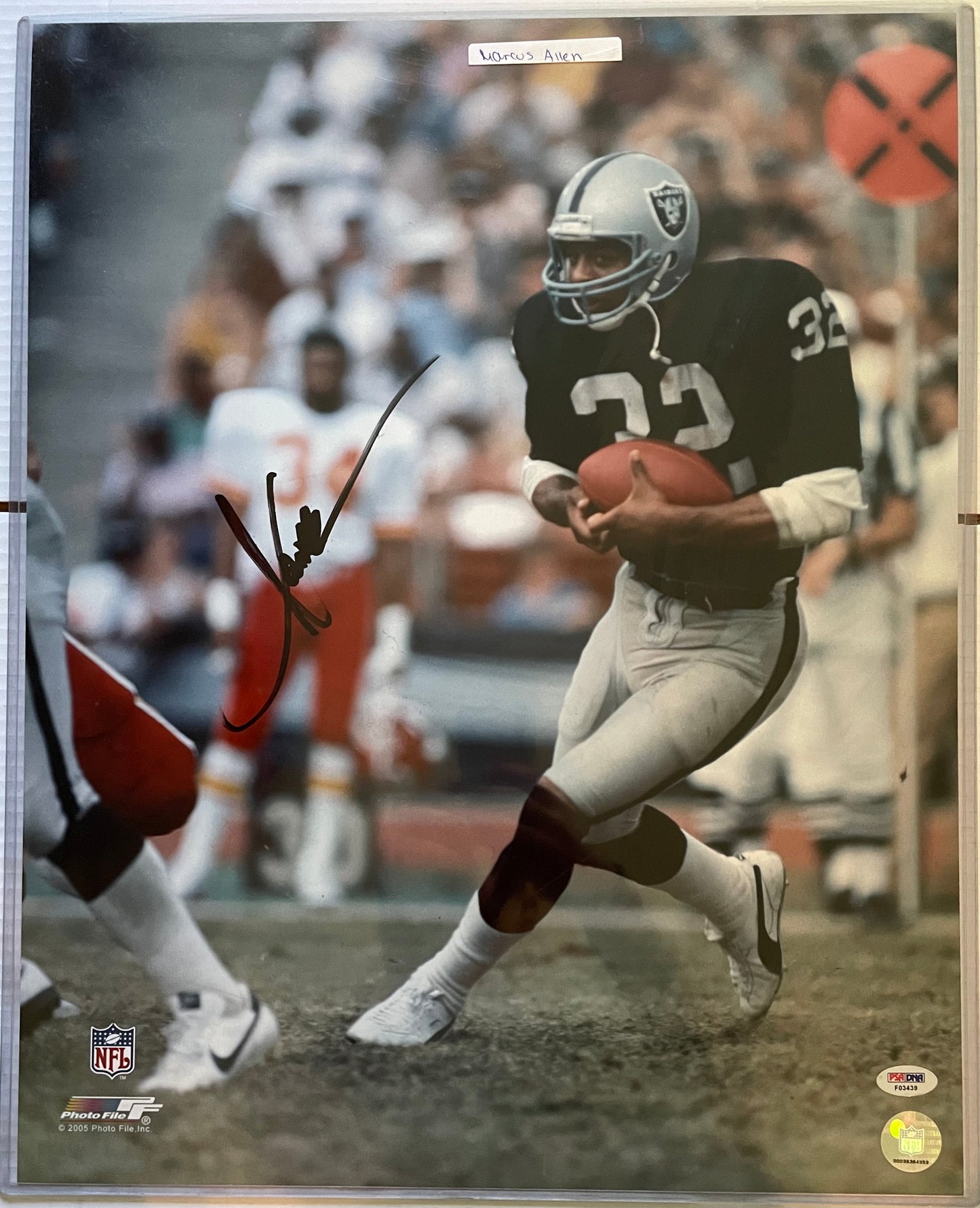 Marcus Allen Raiders Autographed Football 16x20 Photo with PSA COA