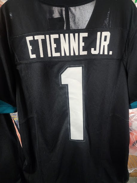 NWOT Travis Etienne Jaguars Nike Licensed Football Jersey Size L Unsigned