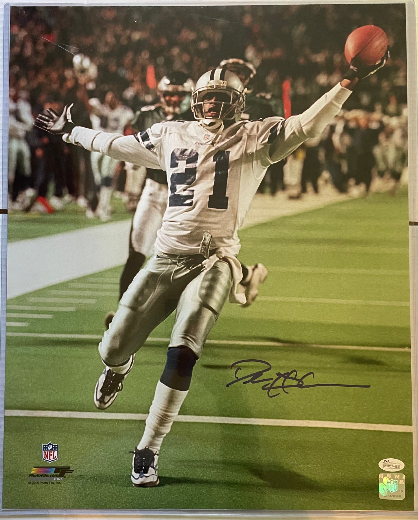 Deion Sanders Cowboys Autographed Football 16x20 Photo With JSA COA