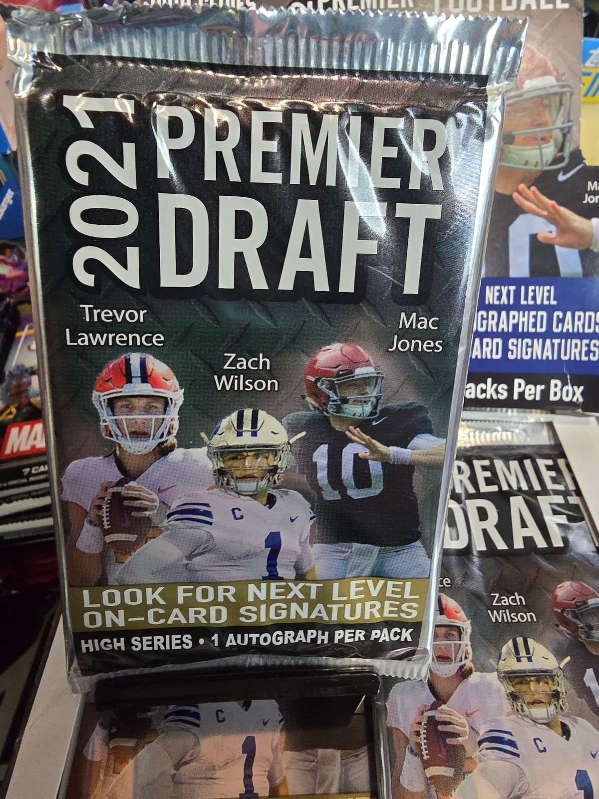 ONE AUTO per pack! 2021 Premier Draft Football Hobby Pack Trevor Lawrence RC?